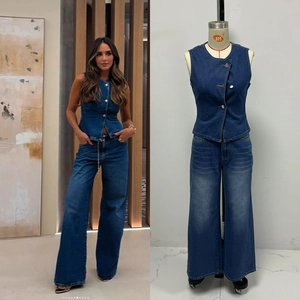Detail of blue two-piece denim vest and wide-leg pants set with button-up design