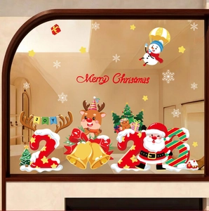 Detail showing festive 2026 Santa and reindeer window stickers with Merry Christmas text