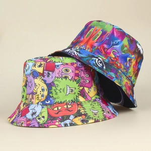 Double-sided reversible bucket hat featuring cartoon monsters and graffiti print street style