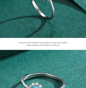 Macro shot of s925 silver crown ring with oval turquoise and pavé cubic zirconia flower