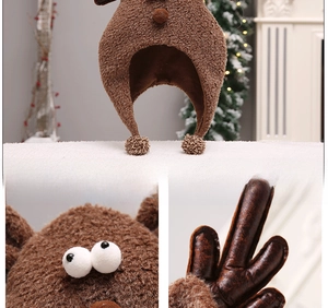 Detailed view of plush reindeer Christmas hat with leather antlers and cute 3D eyes