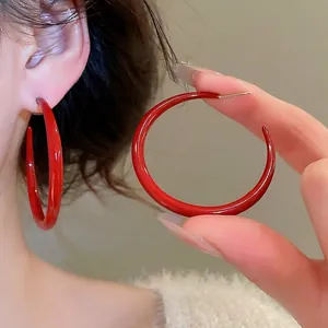Elegant retro red enamel hoop earrings with silver pins for women in a minimalist style