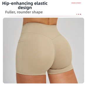 Detail of high waisted yoga shorts with V-shaped back seam and side pockets