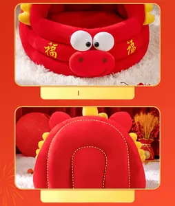 Detail of red plush cat bed with gold embroidery and festive Year of the Snake design