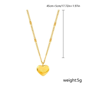 Detail of 18K gold titanium heart necklace with Love engraving and size measurements