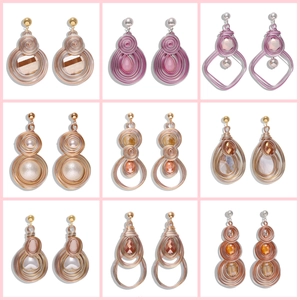 Bohemian wire wrapped heart and pearl earrings set in various gemstone colors