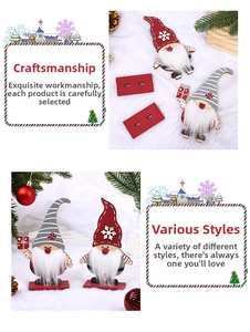 Detail of wooden Christmas gnomes with striped hats and white beards for home decor
