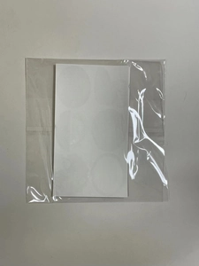 Detail view of 10-piece Christmas gift sticker sheet in transparent OPP packaging