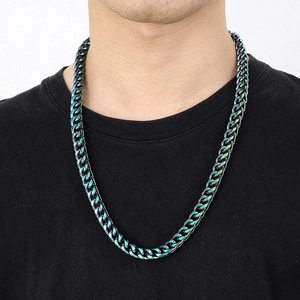 Rainbow plated stainless steel cuban chain necklace worn by a male model
