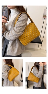 Detailed views of yellow leather shoulder bag with heavy-duty silver rivet studs