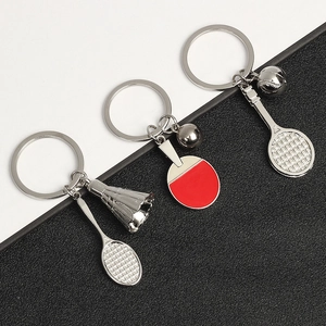 Metal sports keychains set featuring badminton, ping pong, and tennis racket pendants