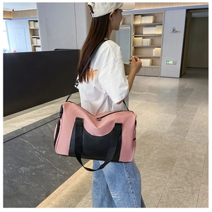 Pink and black sports gym bag with adjustable shoulder strap and large capacity storage