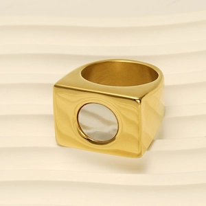 18k gold plated stainless steel square signet ring with white shell inlay on a wavy base
