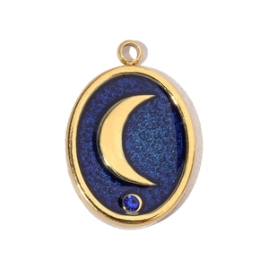 Detail of oval stainless steel moon pendant with blue enamel and crystal accent