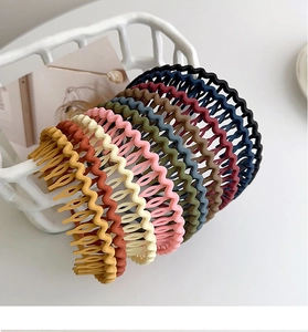 Detailed view of matte non-slip wave headbands in eight elegant Morandi colors