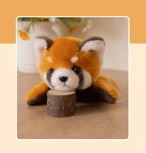 Detailed view of plush red panda puppet with soft orange fur and realistic facial features