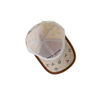 Beige baseball cap with brown trim and grey letter print for kids in 45-degree view