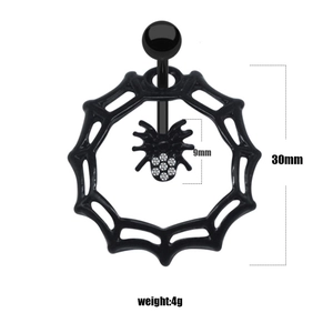 Detail of spider web navel piercing with white rhinestones showing 30mm diameter