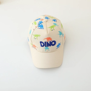 Close-up of children's baseball cap featuring colorful dino prints and DINO embroidery