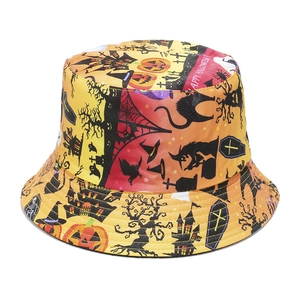 Macro detail of Halloween bucket hat featuring pumpkin patterns and Happy Halloween text