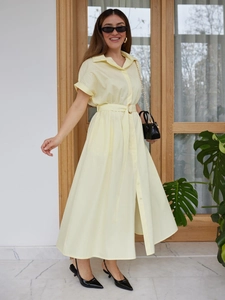 Pale yellow short-sleeve cotton shirt dress with button-up front and a matching belt