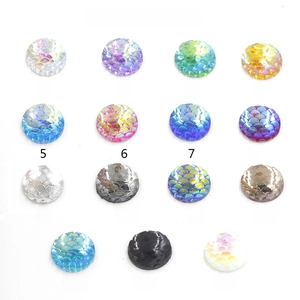 Color chart of 12mm mermaid scale charms in 15 vibrant iridescent holographic styles