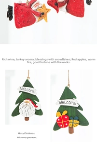 Detail of Christmas iron pentagram star hanging decor with Santa and welcome sign