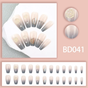Detail of long coffin press-on nails with 3D rose, pearls, and grey gradient design