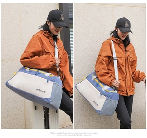 Large capacity travel duffel bag for sports, fitness, short trips, and weekend getaways.