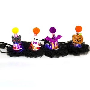 Set of four mini Halloween pet hats with pumpkin, ghost, bat, and black cat designs