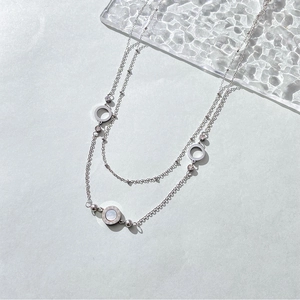 Minimalist stainless steel necklace with Roman numerals and white shell round pendant