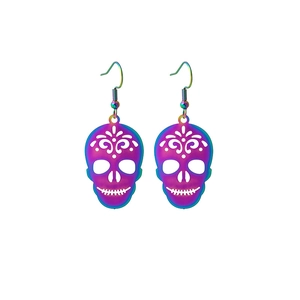 Detailed view of colorful hollow skull earrings with iridescent electroplated finish