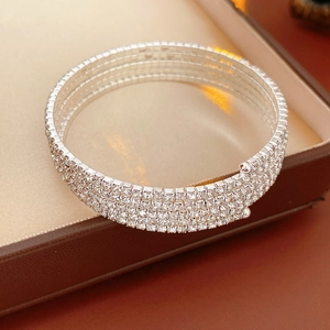 Close-up of five-layer silver stretch bracelet with brilliant micro-pave crystals