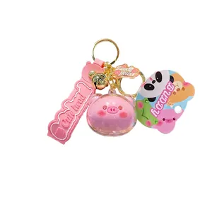 Pink cartoon pig acrylic keychain with silicone strap and golden bell accessory