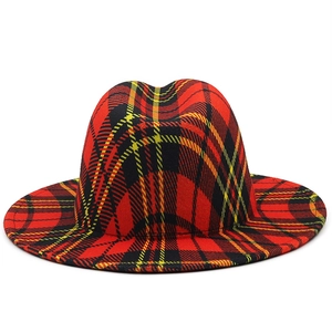 Close-up of red and black plaid wool fedora hat with reinforced stitching on the brim