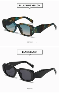 Detail of square sunglasses with chunky blue-yellow frames and geometric temples