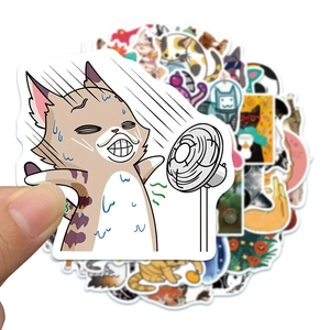 Close-up of cute cartoon cat stickers with funny expressions for laptops and water bottles
