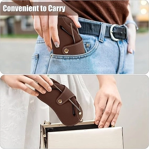 Slim dark brown pebble leather sunglasses pouch shown fitting in a pocket and handbag