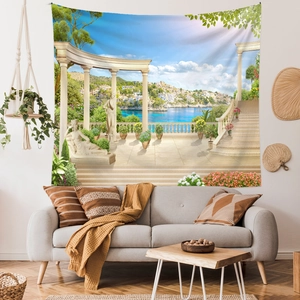 Mediterranean landscape wall tapestry displayed over a sofa in a minimalist living room