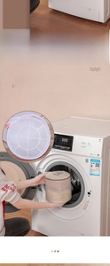 Detail of mesh laundry bags for delicates featuring protective plastic support frames