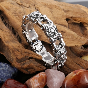 Macro shot of stainless steel lion head bracelet with detailed engraving on clasp