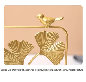 Detail of golden ginkgo leaf metal wall decor with manual welding and high-temp paint