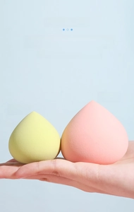 Detailed comparison of peach makeup sponges expanding in size when wet for smooth makeup