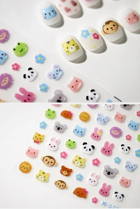 Detailed macro view of 3D embossed cute animal nail stickers featuring panda and rabbit