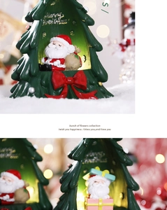 Detailed view of resin Christmas tree ornament with mini Santa Claus and festive texture