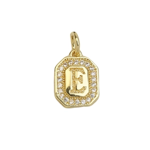 Macro shot of gold plated square pendant featuring letter E and cubic zirconia inlays