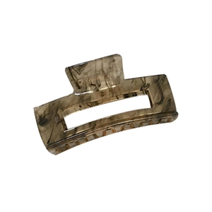 Brown marble pattern acrylic hair claw clip for women on a white background