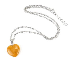 Faceted orange natural stone heart pendant necklace with elegant silver-tone chain