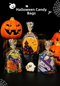 Detail of Halloween treat bags with cartoon bear and rabbit prints and gold twist ties