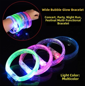 Macro shot of LED glowing bubble bracelets in multiple colors on a dark background